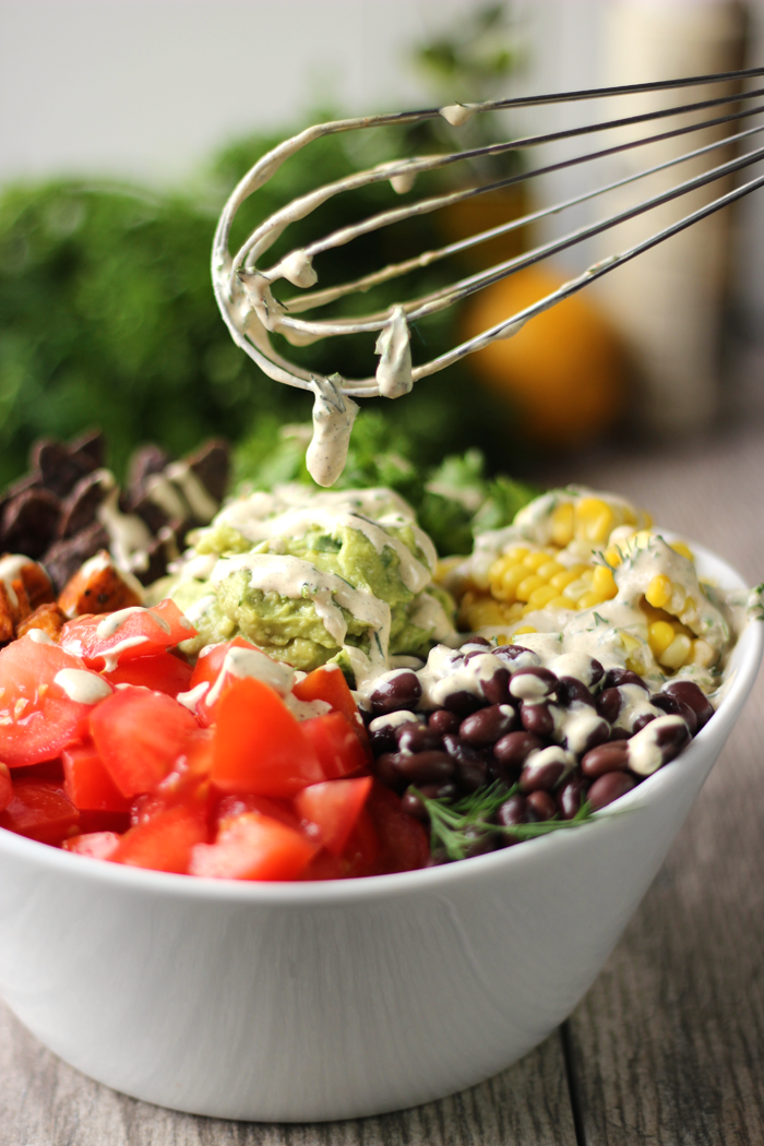 A healthy taco salad bowl with a creamy ranch hemp dressing.