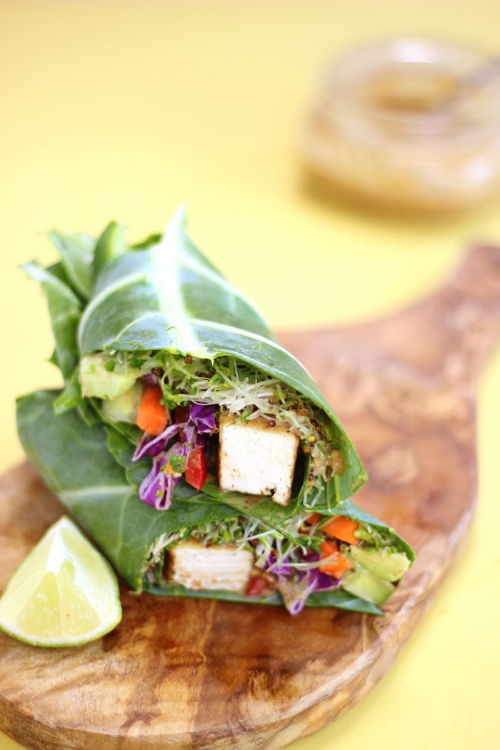 Grilled Tofu in a collard green wrap filled with crunchy sweet veggies and drizzled with a sweet and savoury Thai almond sauce.