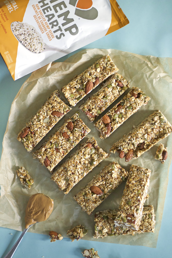 Hearty chewy granola bars loaded with toasted oats and almonds and a date and peanut butter caramel to hold it all together. | HEALTHNUT NUTRITION |