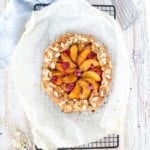 A rustic Galette filled with juicy peaches and tart raspberries, for the perfect end of summer dessert and the easiest pie you will ever make!