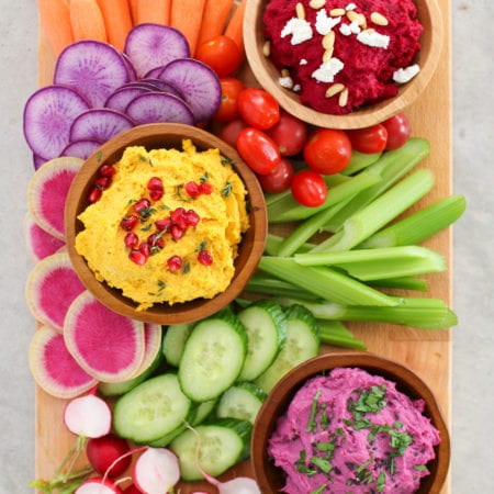 Vibrant veggie based hummus three ways to serve with your favourite crackers, chips and fresh veggies - perfect for any party or get together!