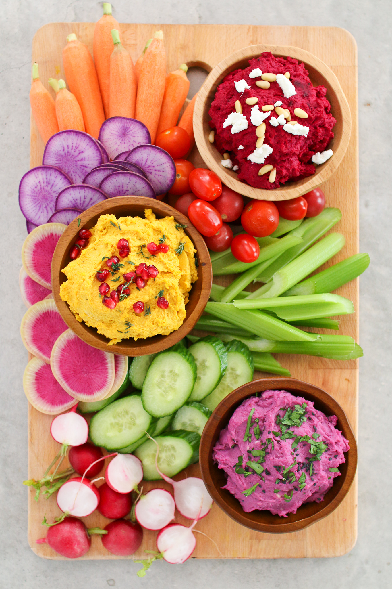 Vibrant veggie based hummus three ways to serve with your favourite crackers, chips and fresh veggies - perfect for any party or get together!