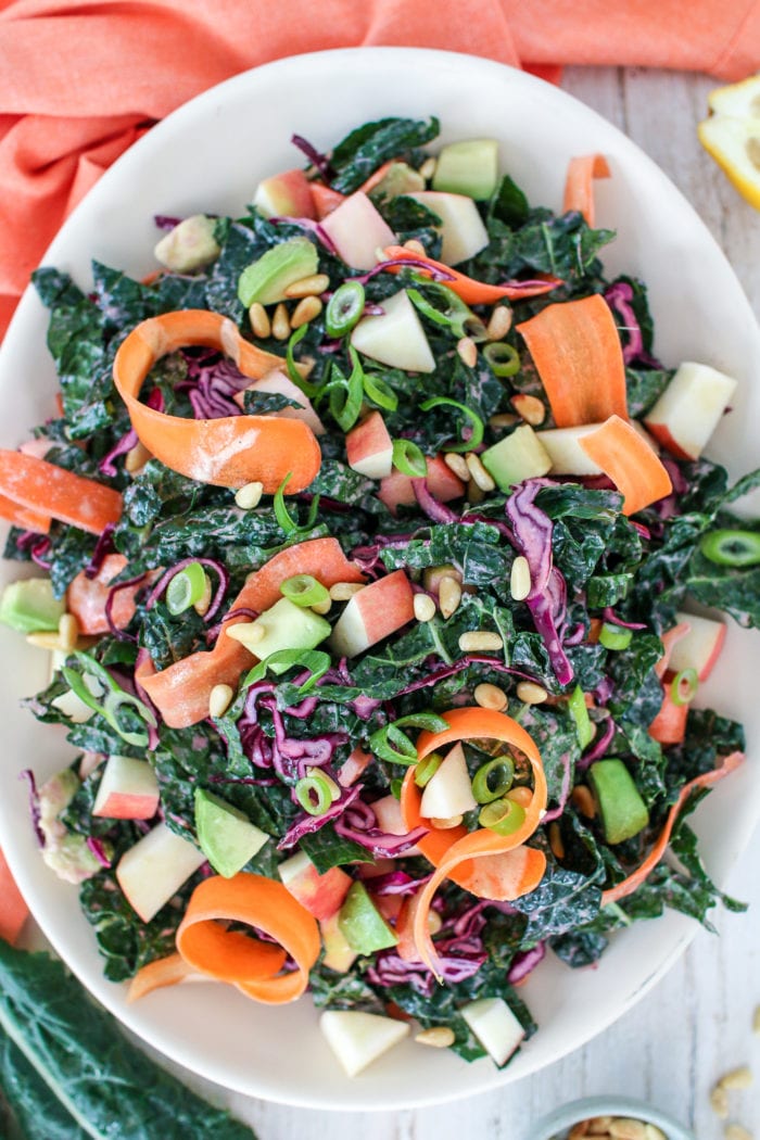 This seriously delicious winter detox salad made with crunchy kale, red cabbage and crispy apples, topped with a zingy lemony ginger dressing is the only salad you will want to eat this winter.