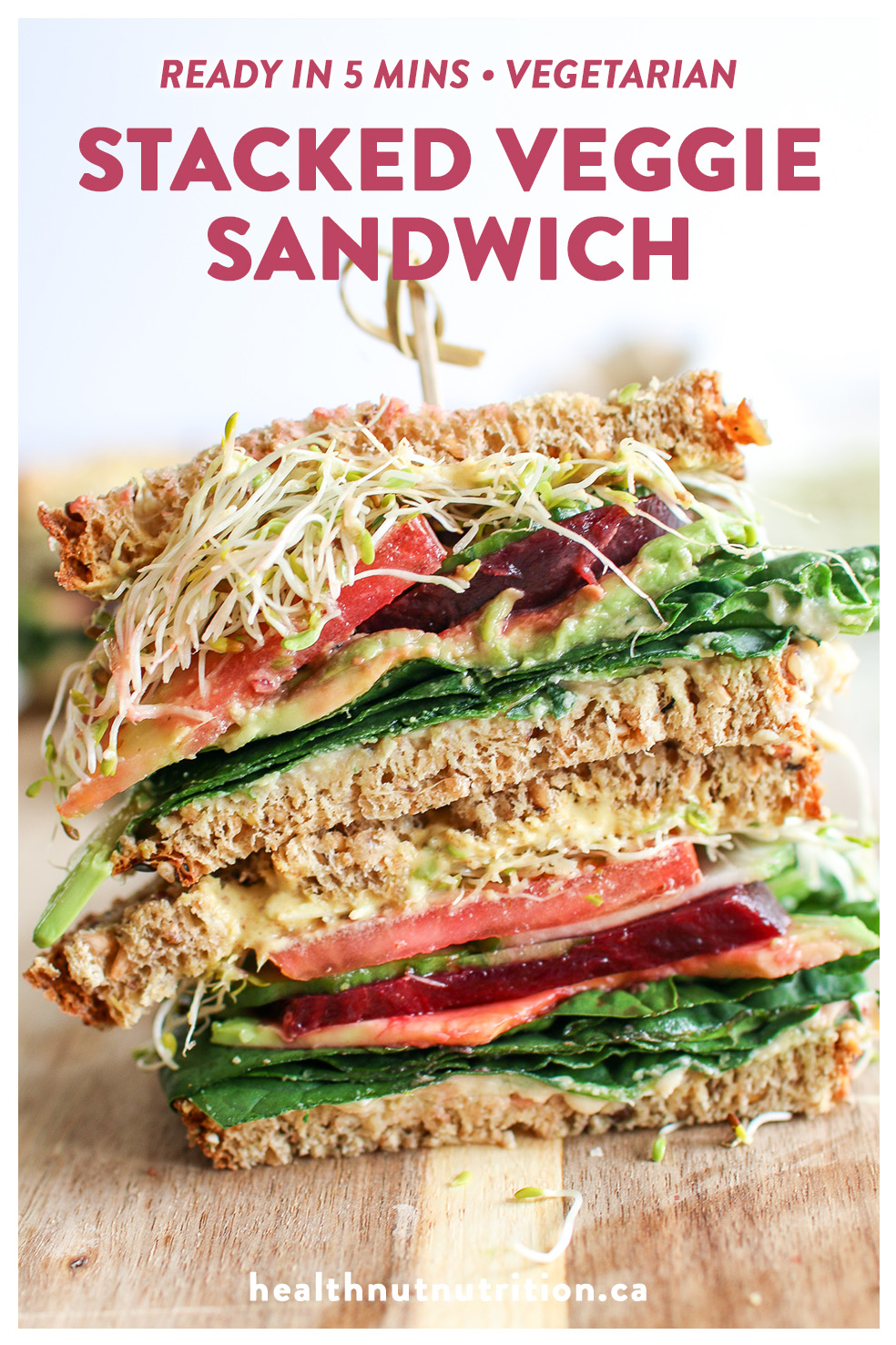 A colourful veggie sandwich stacked with fresh spinach, creamy avocado, crunchy cucumbers, tomatoes, beets and microgreens, smooshed between your favourite bread and smothered in caramelized onion hummus and creamy aioli. The ultimate sammy!