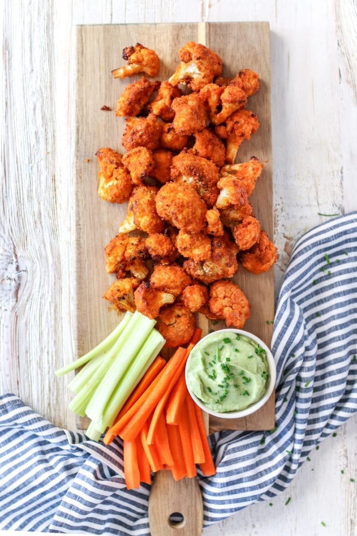 These healthy baked cauliflower wings are saucy and crispy on the outside and tender on the inside. They are full of flavour and perfect enjoyed as a side, appetizer or game night!