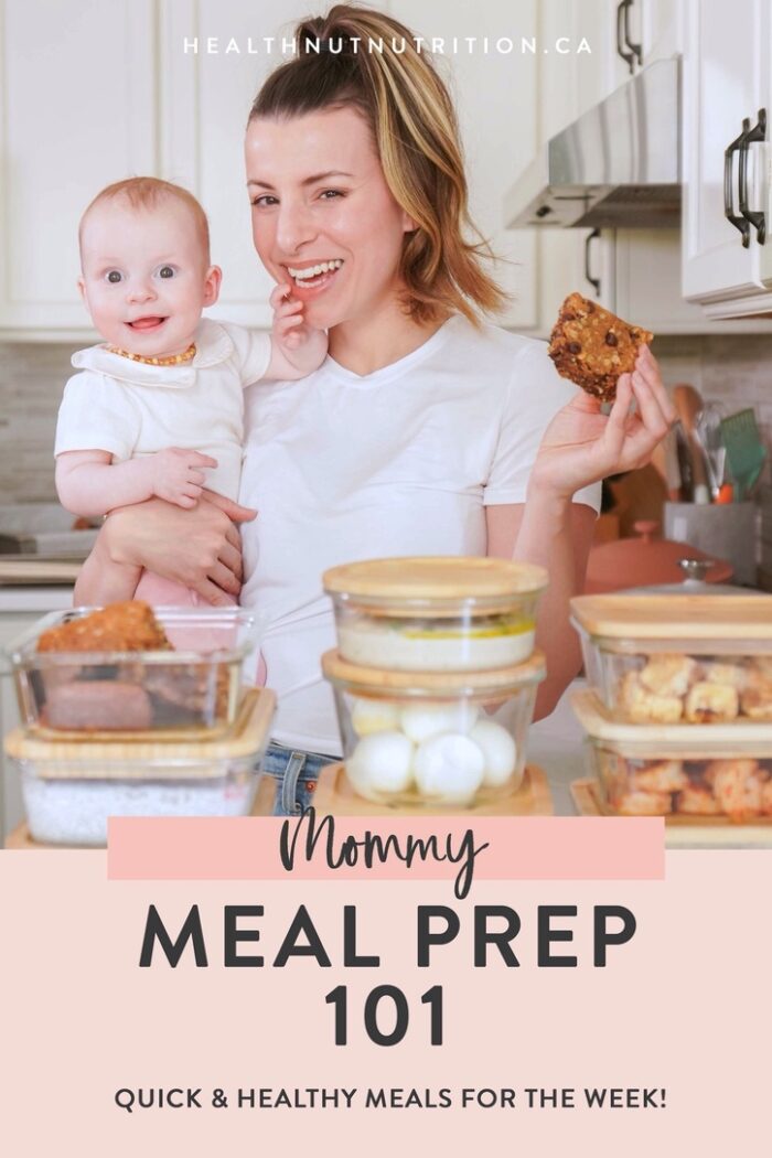 a mom holding her baby showing off her meal prepped food