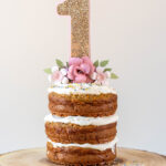 naked smash cake on a wooden platter