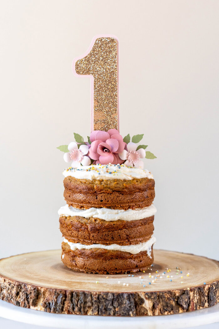 naked smash cake on a wooden platter